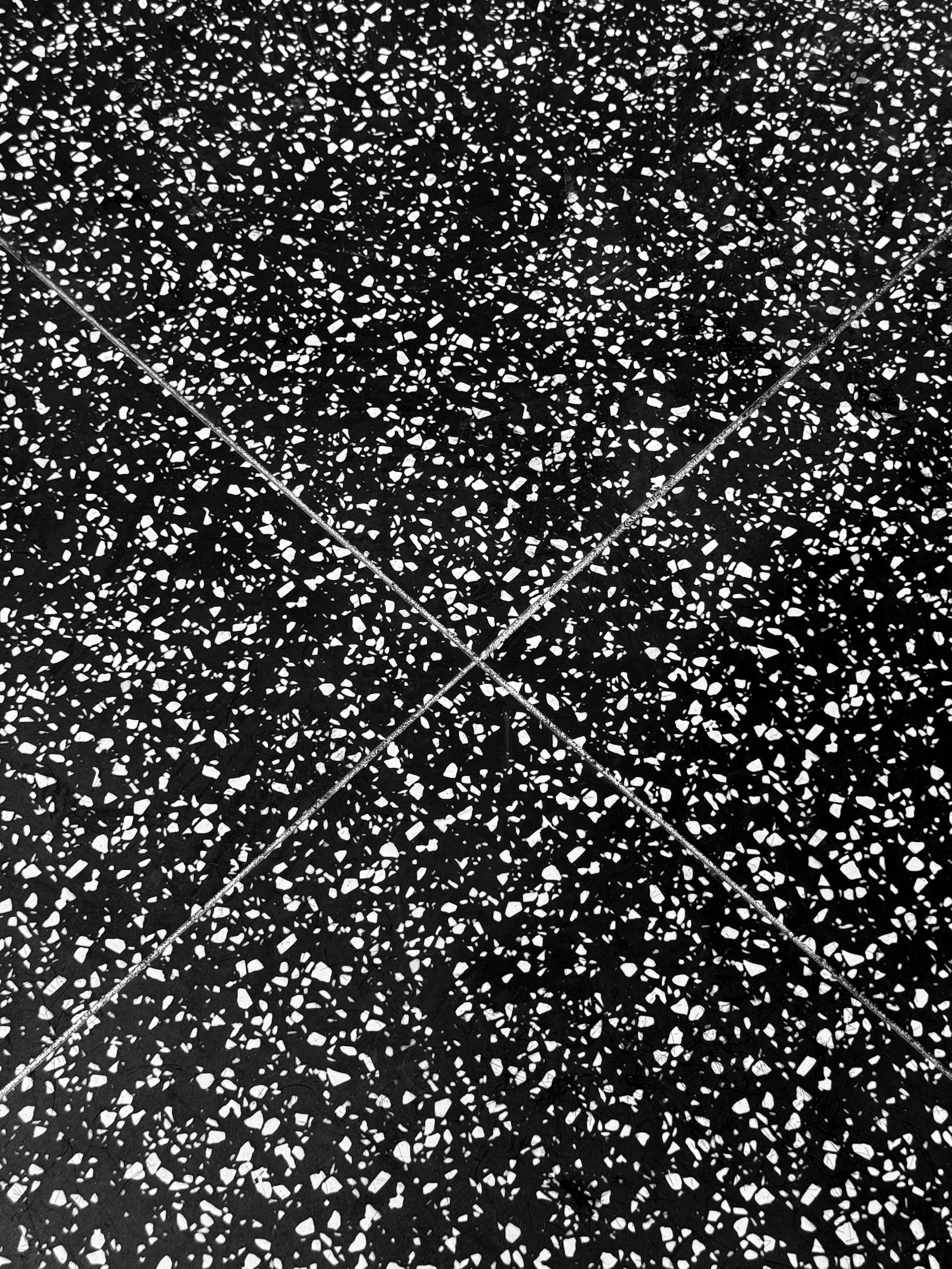 Close-up of finished polyaspartic flake floor coating